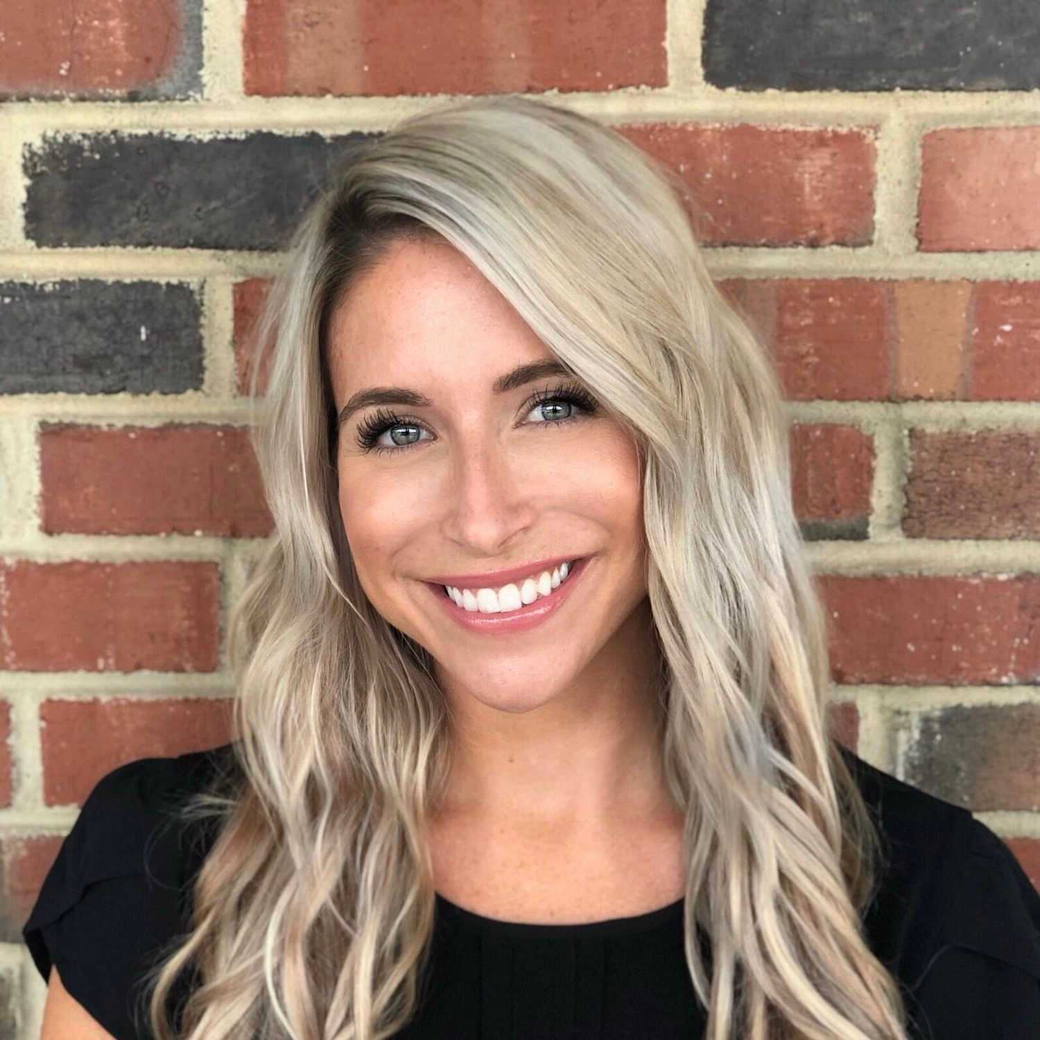 Portrait of STACEY STRATTON, a professional stylist at Beyond the Fringe Hair Designs, showcasing their expertise and style.