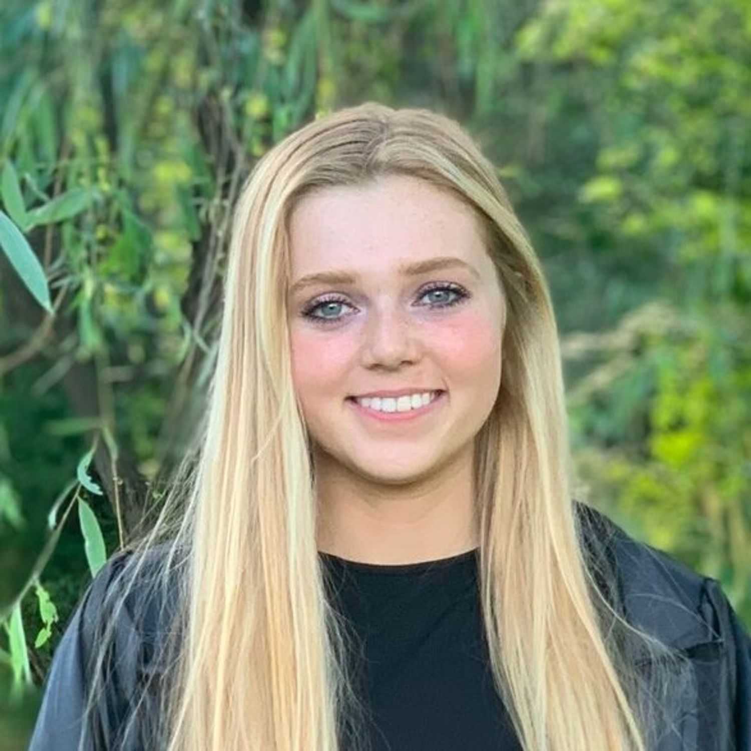 Portrait of EMMA KAETZEL, a professional stylist at Beyond the Fringe Hair Designs, showcasing their expertise and style.